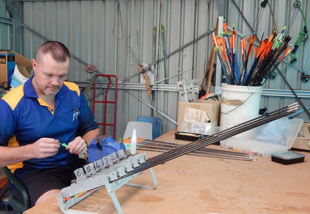 MPB volunteer fixing arrows